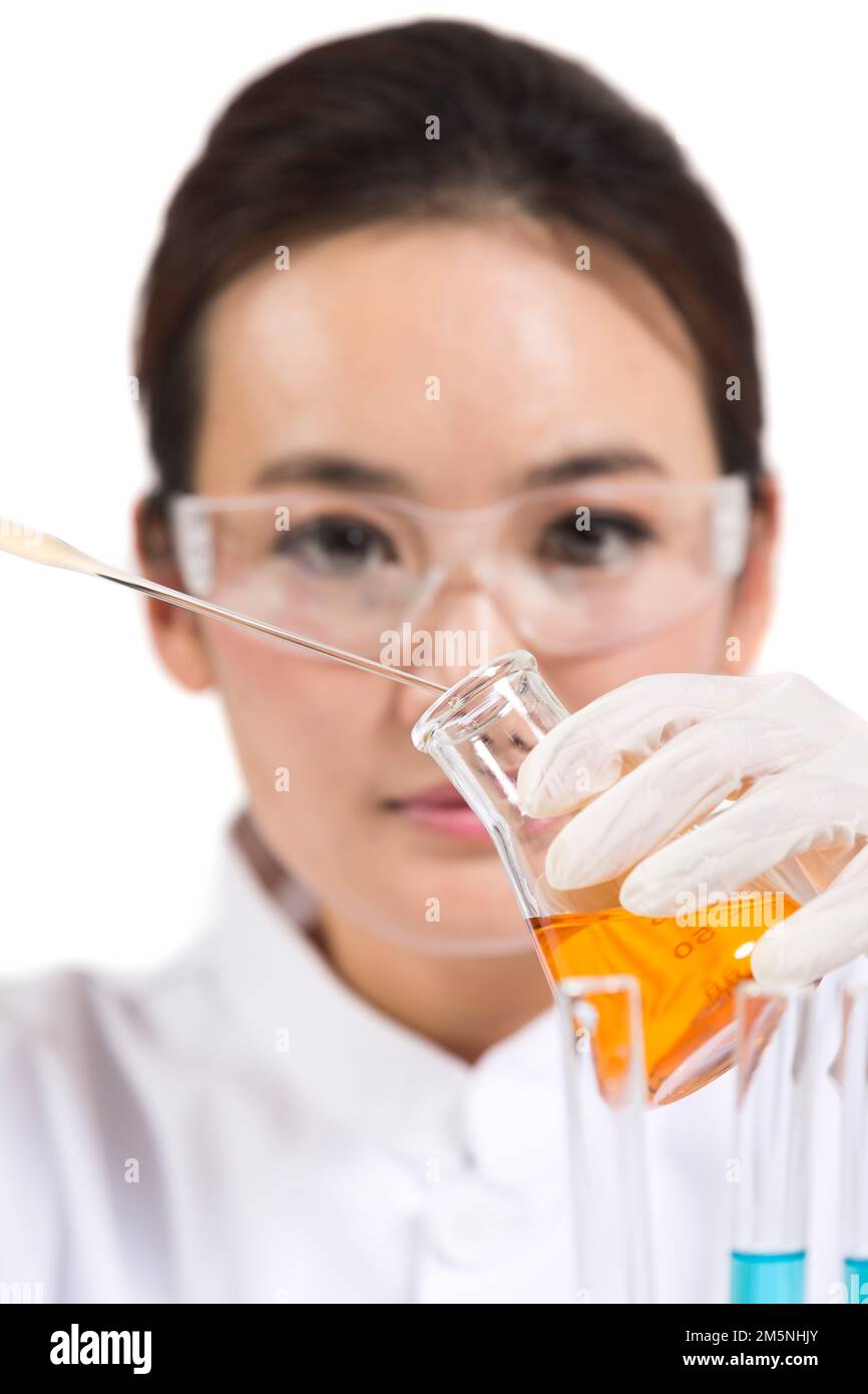 The reagent women scientists observed in vitro Stock Photo