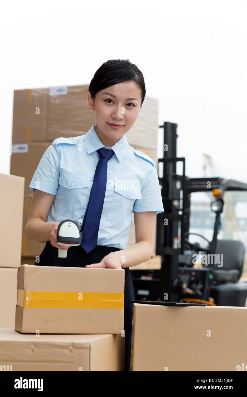 Scan cargo logistics warehouse management personnel Stock Photo Alamy