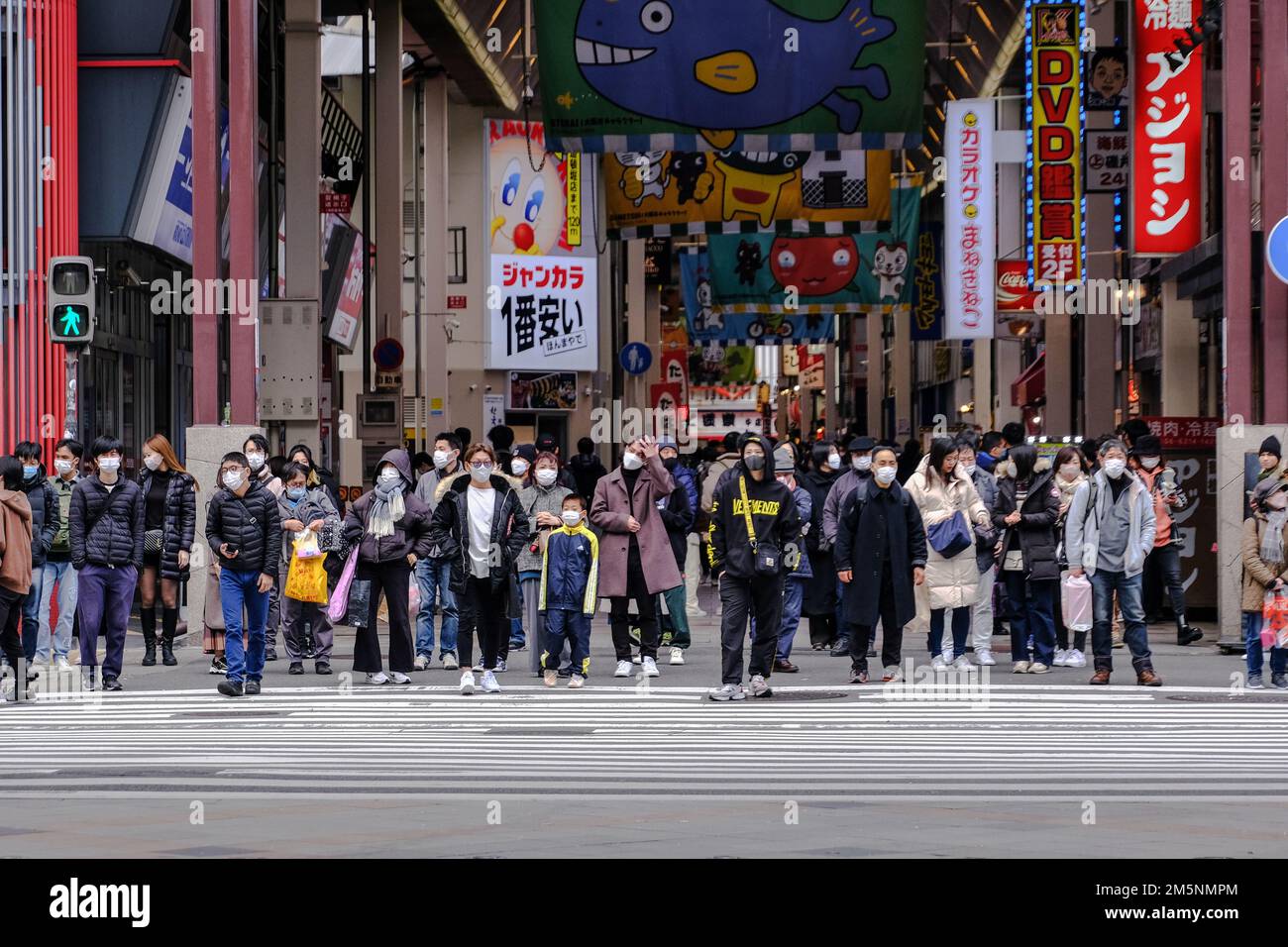 People shop along the streets of Shinsaibashi in Osaka, Japan
