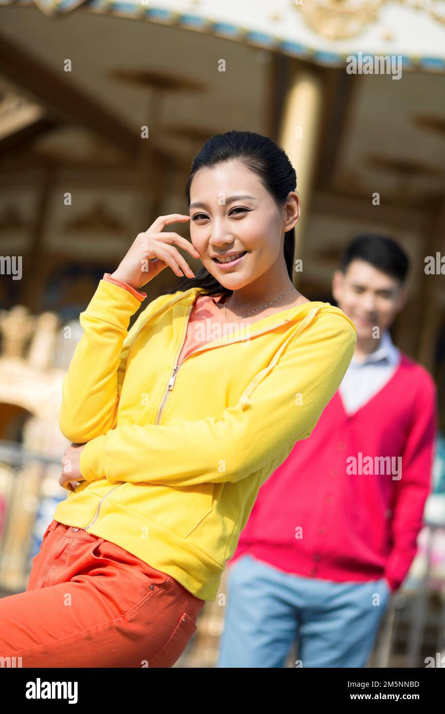 Young couples to play in the amusement park Stock Photo - Alamy