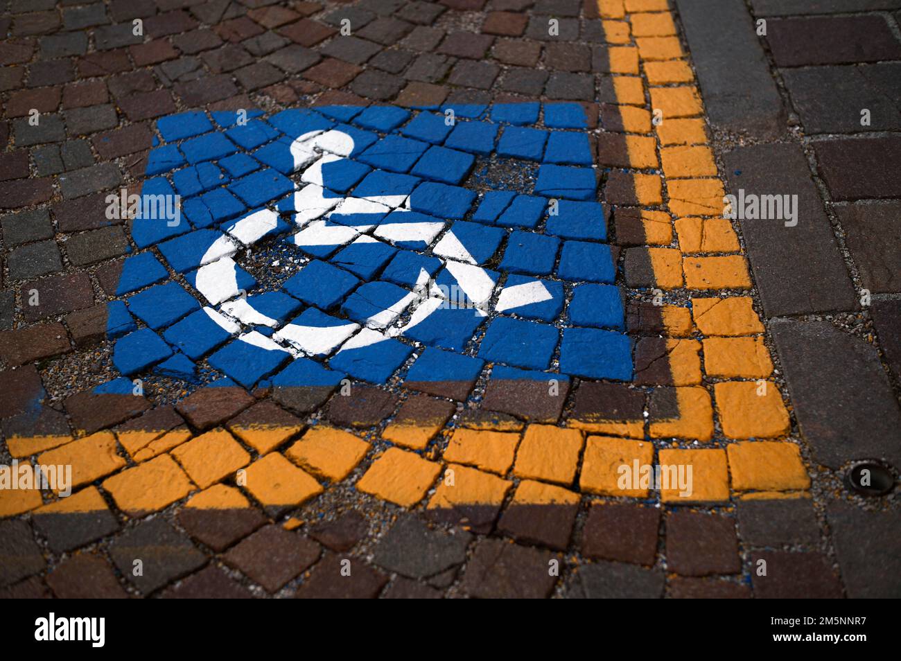 Reserved for wheelchair, severely disabled, marking on pavement, Ortisei, Val Gardena, South Tyrol, Italy Stock Photo