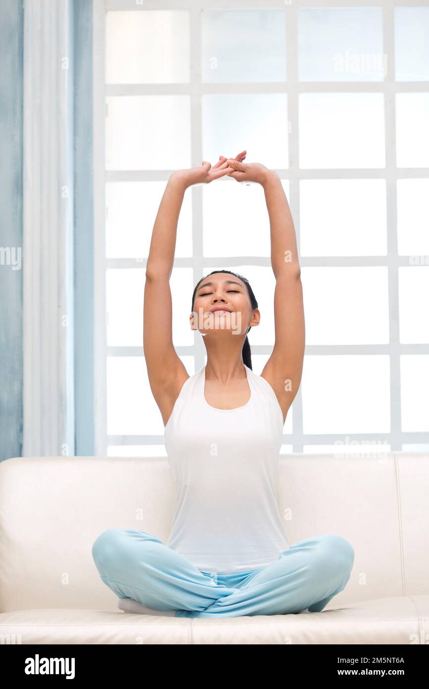 The young woman do yoga Stock Photo - Alamy