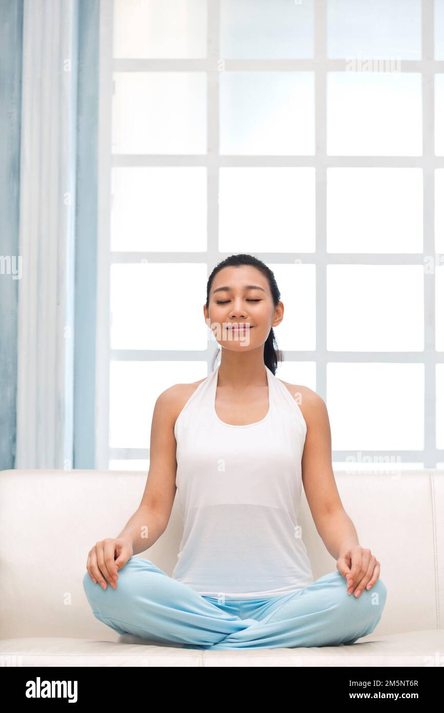 The young woman do yoga Stock Photo - Alamy