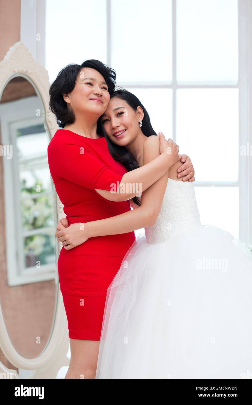 The bride and mother hug Stock Photo