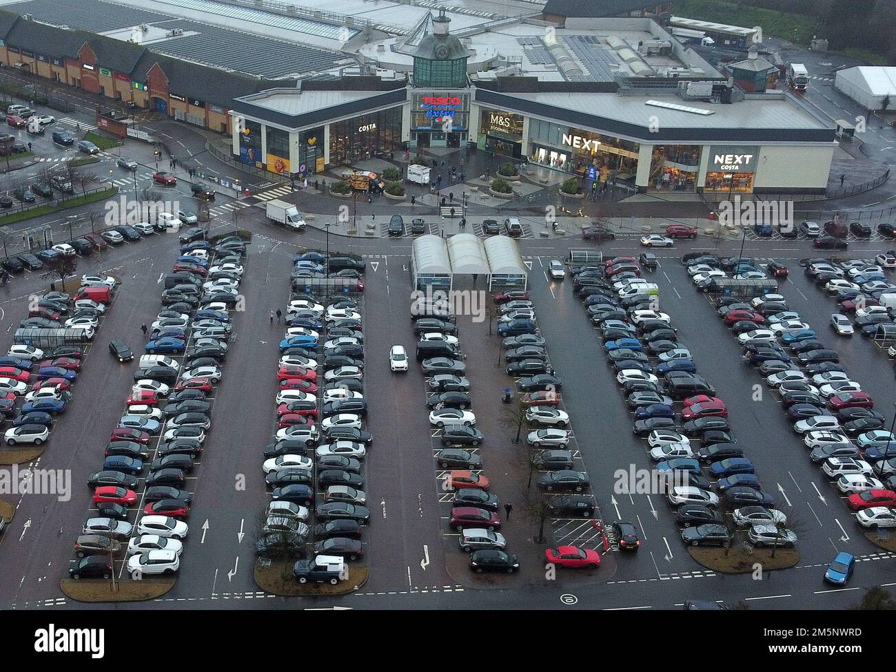 The Tesco eXtra Serpentine Green Shopping Centre car park is packed