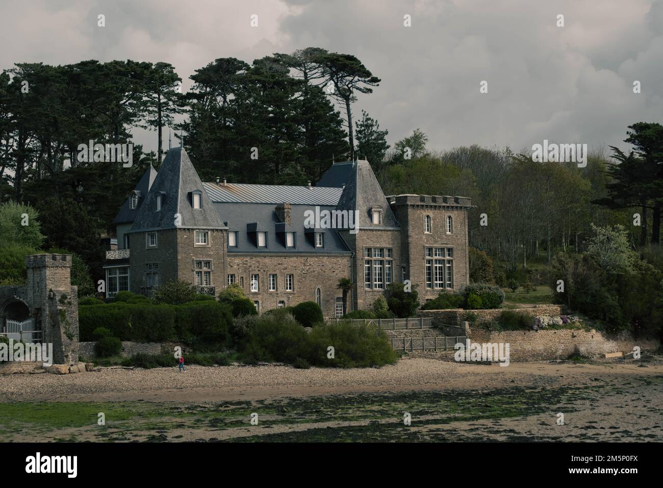 A very big and dark house on a beach in brittany Stock Photo