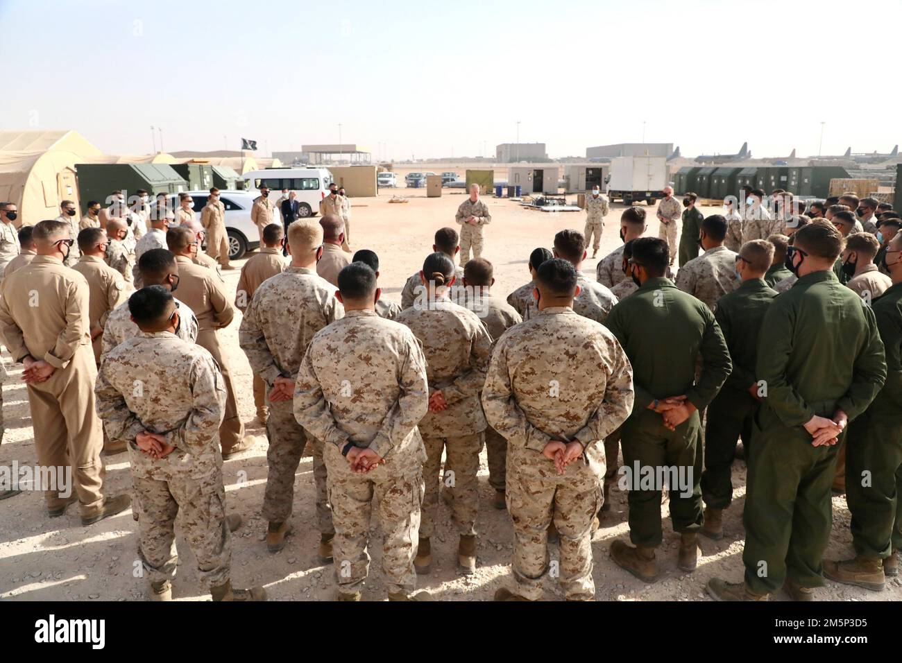 U.S. Marine Corps Maj. Gen. Paul Rock, Commander, U.S. Marine Corps Forces Central Command speaks with Marines with Marine Fighter Attack Squadron 115 (VMFA-115) during his visit to Prince Sultan Air Base, Kingdom of Saudi Arabia on Feb. 27, 2022. VMFA-115 has been deployed to Prince Sultan Air Base in the Kingdom of Saudi Arabia since December 2021 and are an integral part of the Immediate Response Force in the Central Command area of responsibility. Stock Photo