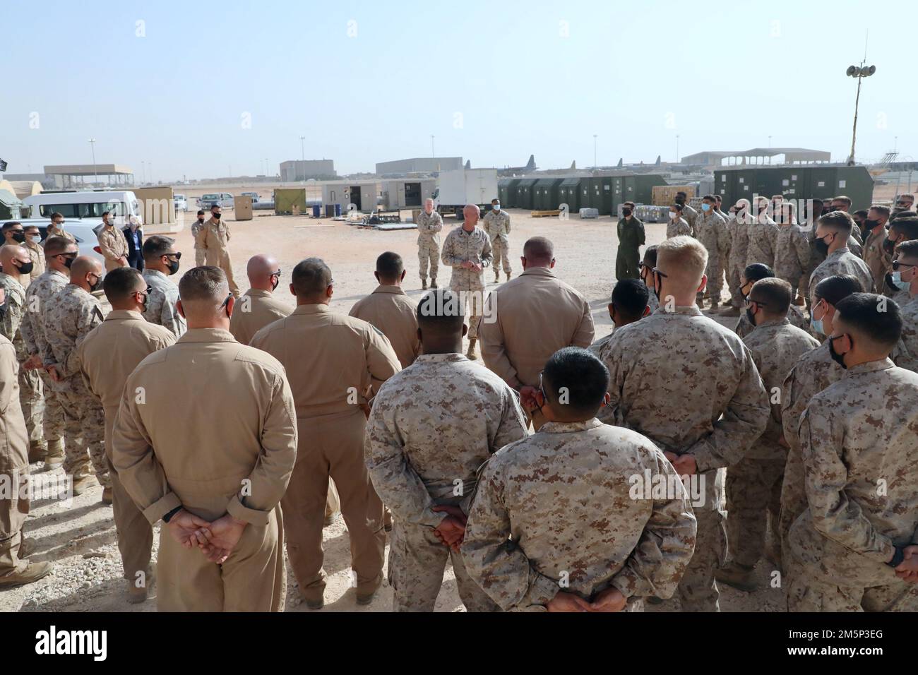 U.S. Marine Corps Sergeant Maj. Steven Lunsford, Sergeant Major, U.S. Marine Corps Forces Central Command speaks with Marines with Marine Fighter Attack Squadron 115 (VMFA-115) during his visit to Prince Sultan Air Base, Kingdom of Saudi Arabia on Feb. 27, 2022. VMFA-115 has been deployed to Prince Sultan Air Base in the Kingdom of Saudi Arabia since December 2021 and are an integral part of the Immediate Response Force in the Central Command area of responsibility. Stock Photo