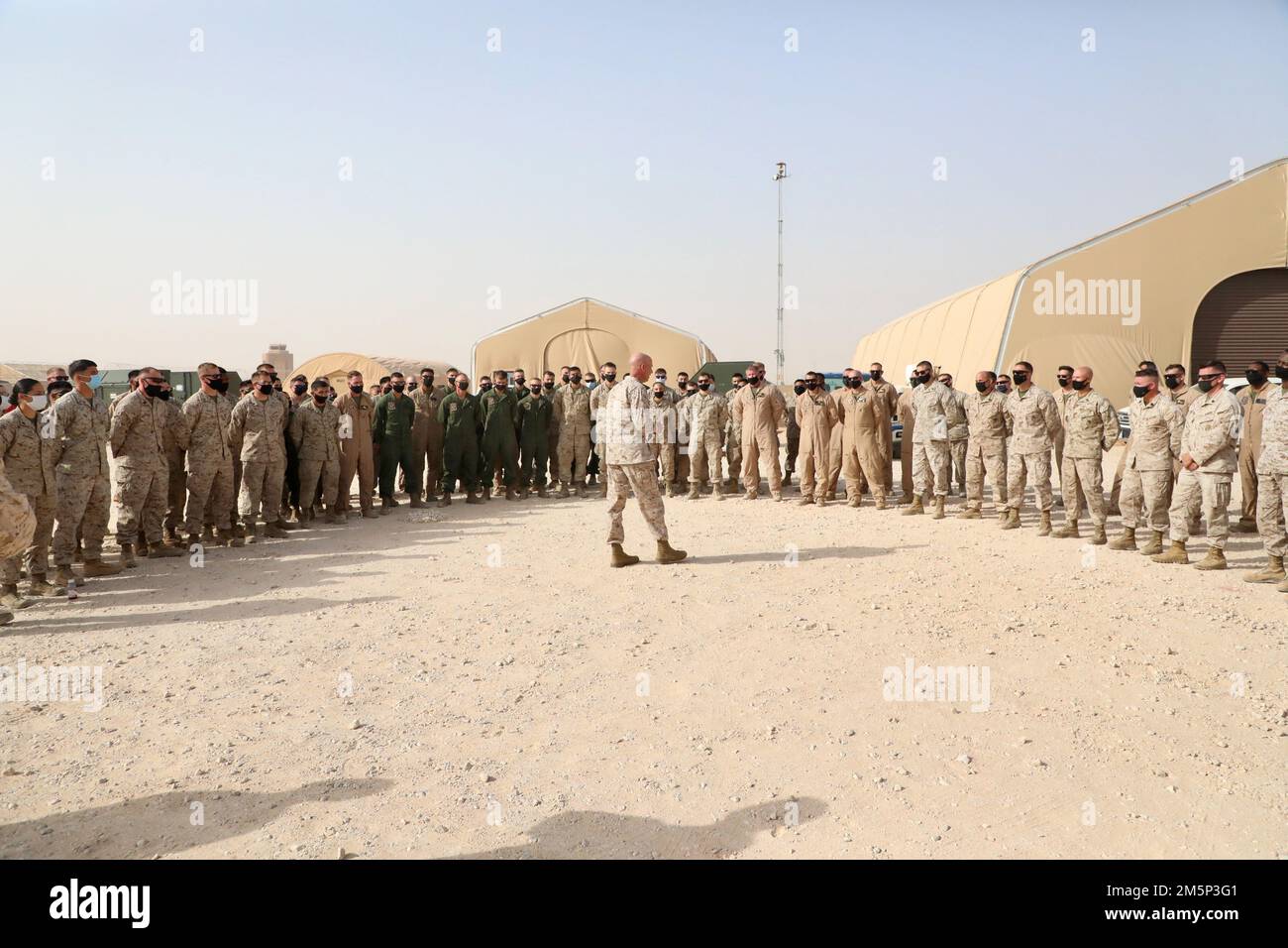 U.S. Marine Corps Sergeant Maj. Steven Lunsford, Sergeant Major, U.S. Marine Corps Forces Central Command speaks with Marines with Marine Fighter Attack Squadron 115 (VMFA-115) during his visit to Prince Sultan Air Base, Kingdom of Saudi Arabia on Feb. 27, 2022. VMFA-115 has been deployed to Prince Sultan Air Base in the Kingdom of Saudi Arabia since December 2021 and are an integral part of the Immediate Response Force in the Central Command area of responsibility. Stock Photo