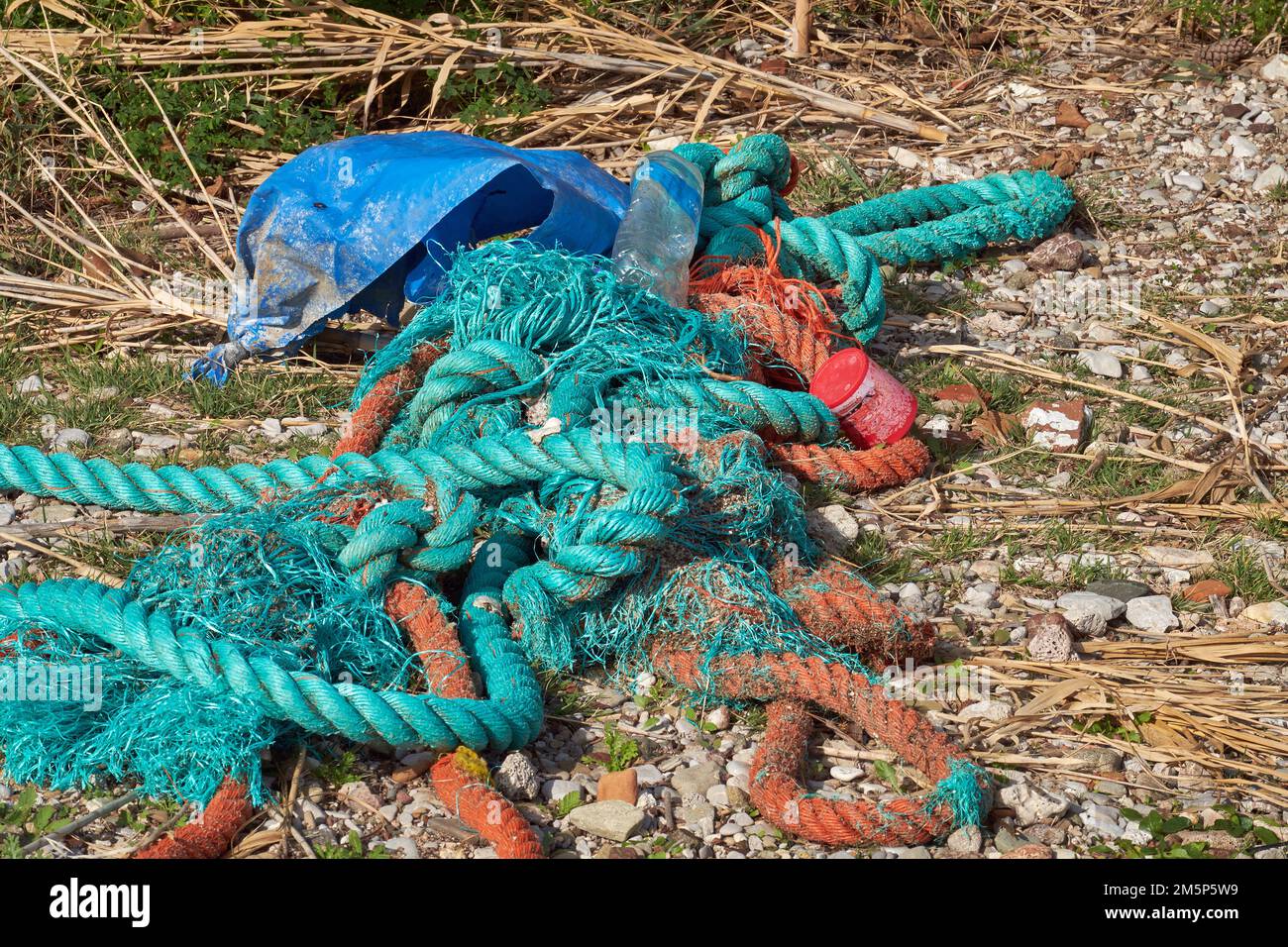 Cordage and plastic rubbish washed up on the beach, Peloponnese, Greece Stock Photo