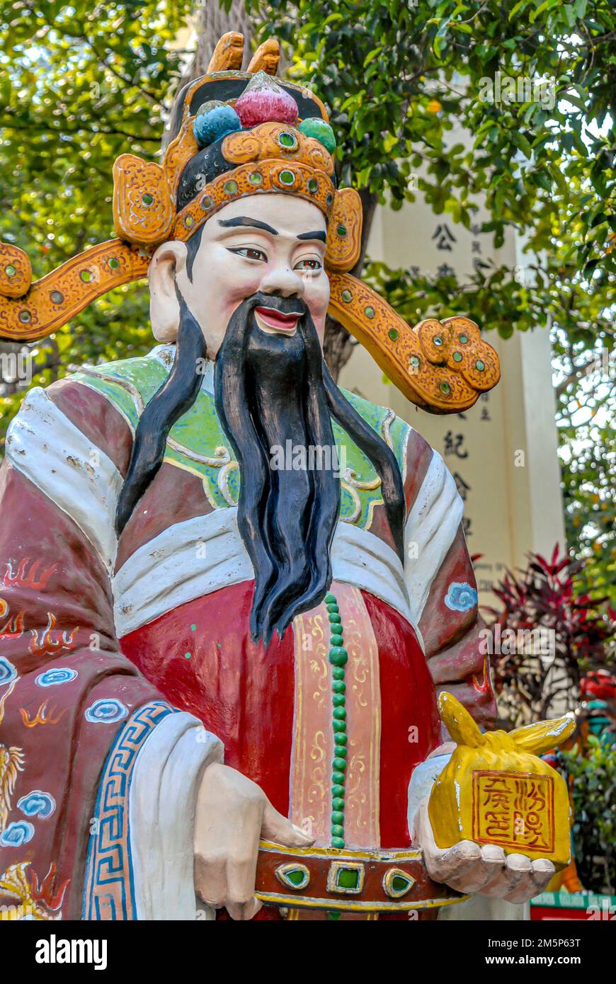 Immortal Lu the god of Wealth at the Tiger Balm Garden Haw Par Villa in Singapore Stock Photo