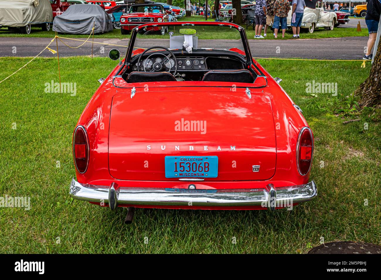 Iola, WI - July 07, 2022: High perspective rear view of a 1965 Sunbeam Alpine MK IV Convertible at a local car show. Stock Photo