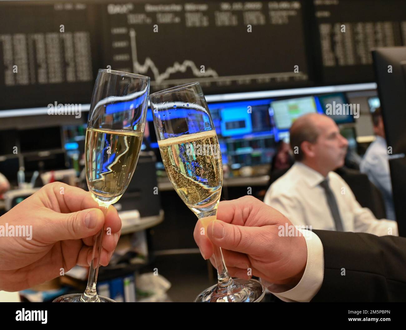 30 december 2022 hessen frankfurt main traders toast with champagne
