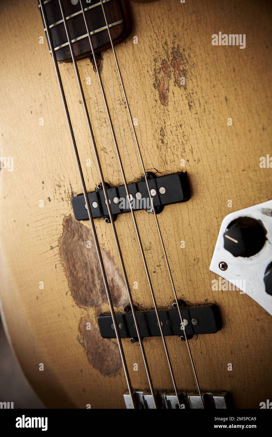 Norman Watt-Roy's replica 1962 Shoreline Gold Fender Jazz Bass backstage at the Rock Against Cancer festival, Wiltshire. Stock Photo