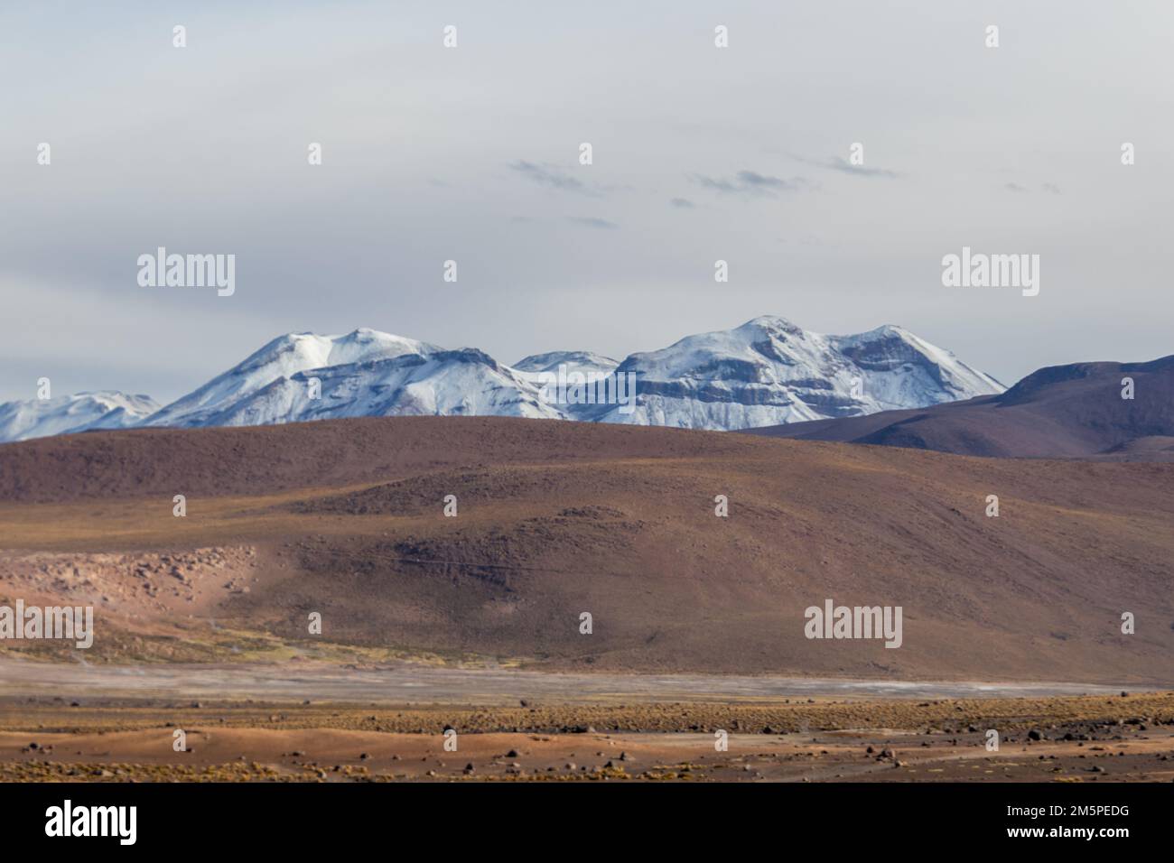 Snow covering the peaks of mountains in Atacama, the driest de…