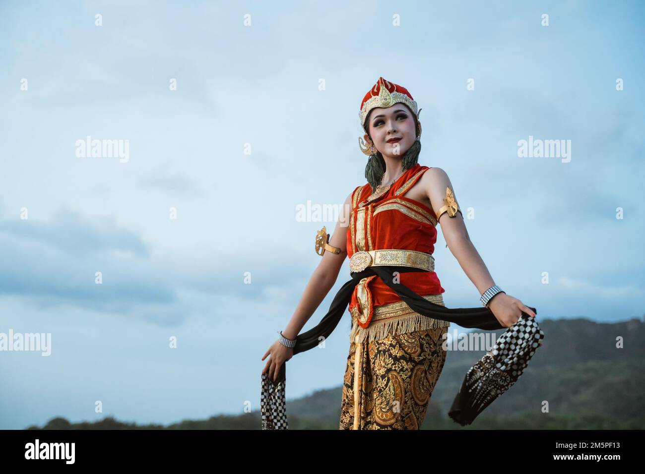 women presenting traditional Javanese dance movements Stock Photo