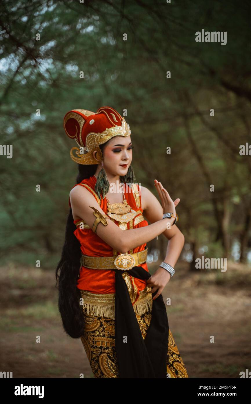 women presenting traditional Javanese dance movements Stock Photo