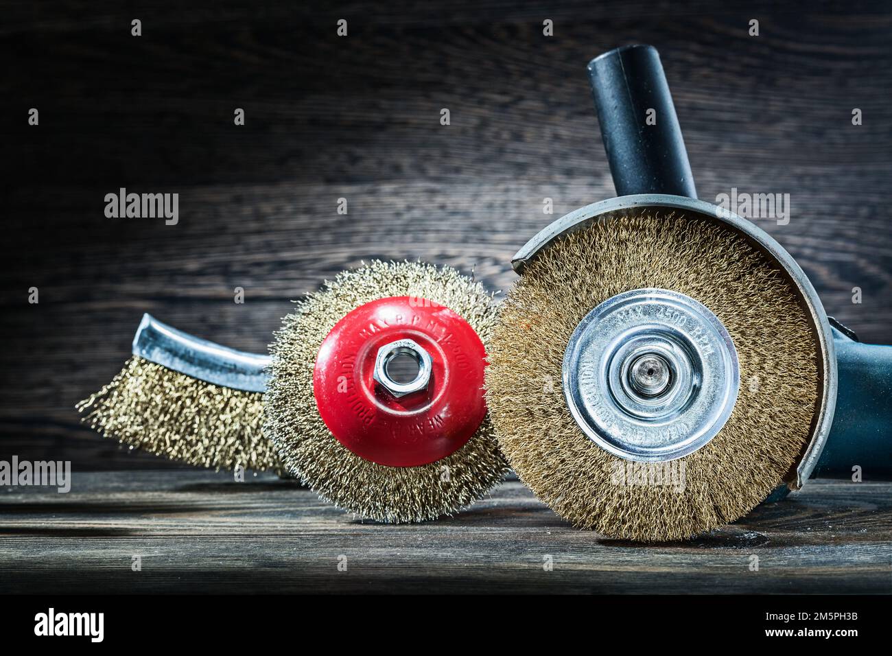 angle grinder with set of abrasive wire brushes Stock Photo