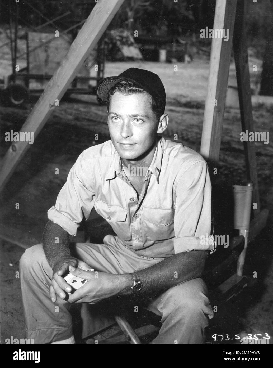 JOHN KERR on set location candid during filming of RODGERS and HAMMERSTEIN's SOUTH PACIFIC 1958 director JOSHUA LOGAN music Richard Rodgers lyrics Oscar Hammerstein II based on Tales of the South Pacific by James A. Michener Rodgers and Hammerstein Productions / Magna Theatre Corporation / Twentieth Century Fox Stock Photo