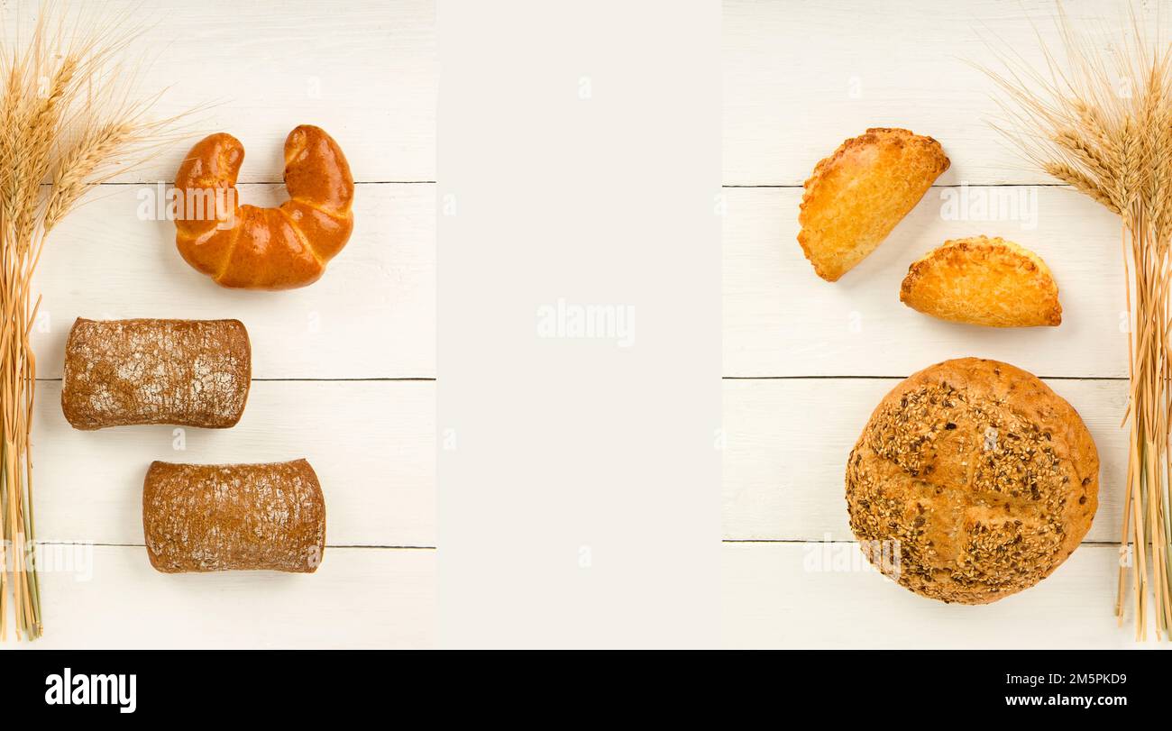 Bread , sweet pastry and ears of wheat isolated on white background ...