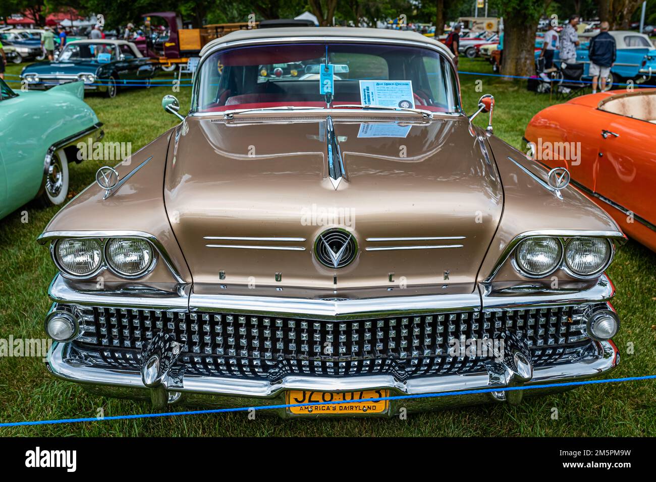 Iola, WI - July 07, 2022: High perspective front view of a 1958 Buick Century Convertible at a local car show. Stock Photo
