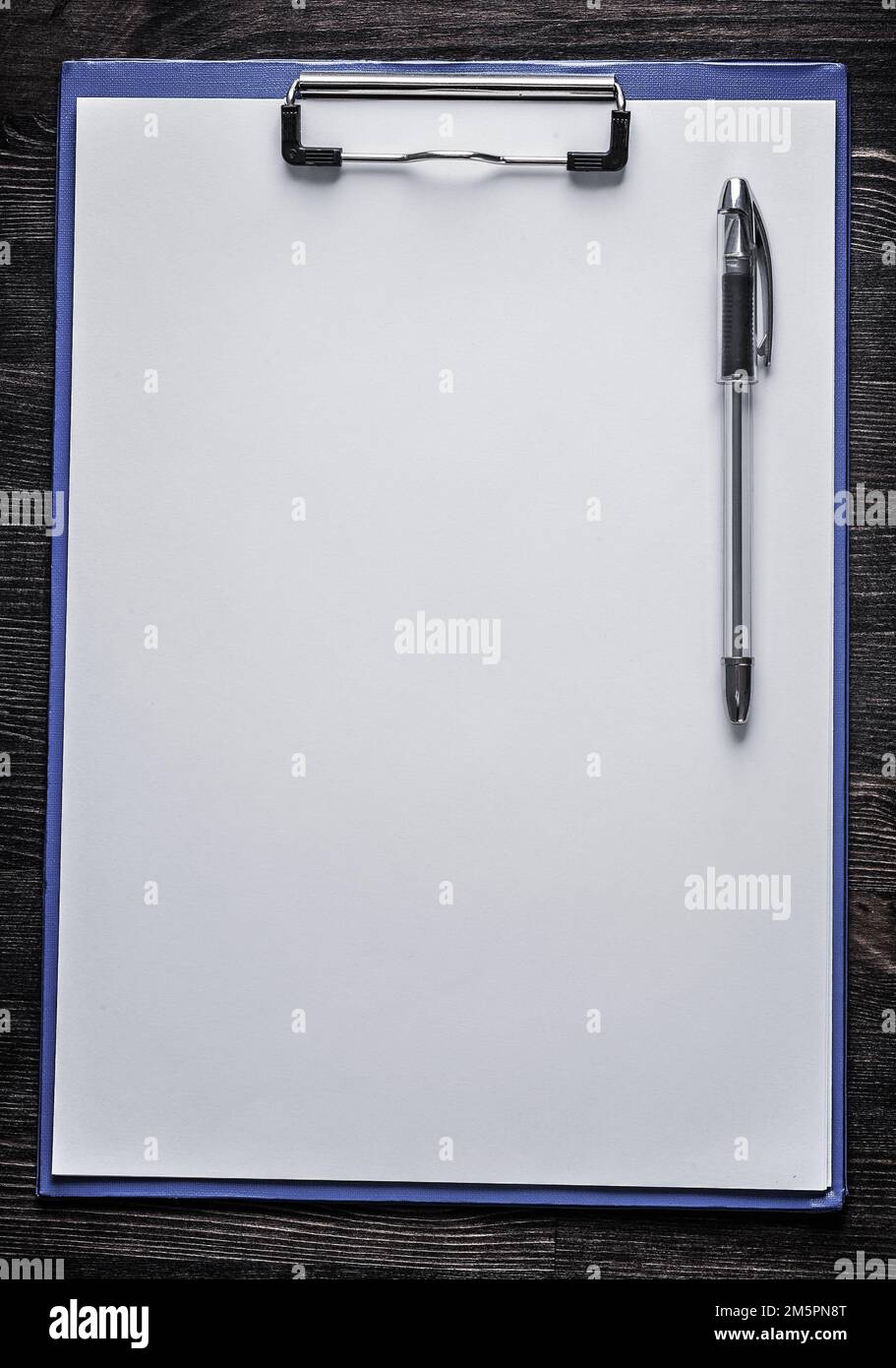 Clean notepad and pen on wood board office concept Stock Photo - Alamy