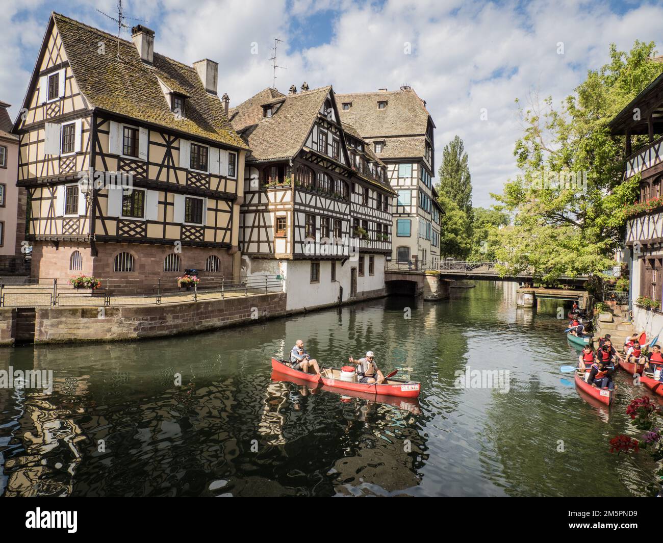 Tourists canoeing on River Ill, Strasbourg, France Stock Photo