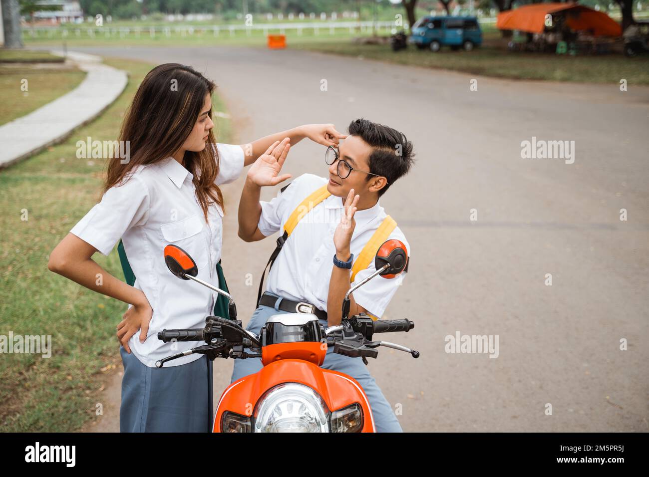 Male student scared when accused by a girl student Stock Photo - Alamy