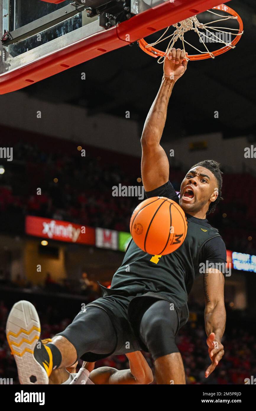 College Park, MD, USA. 29th Dec, 2022. UMBC Retrievers forward Tra'Von Fagan (4) dunks the ball during the NCAA basketball game between the UMBC Retrievers and the Maryland Terrapins at Xfinity Center in College Park, MD. Reggie Hildred/CSM/Alamy Live News Stock Photo
