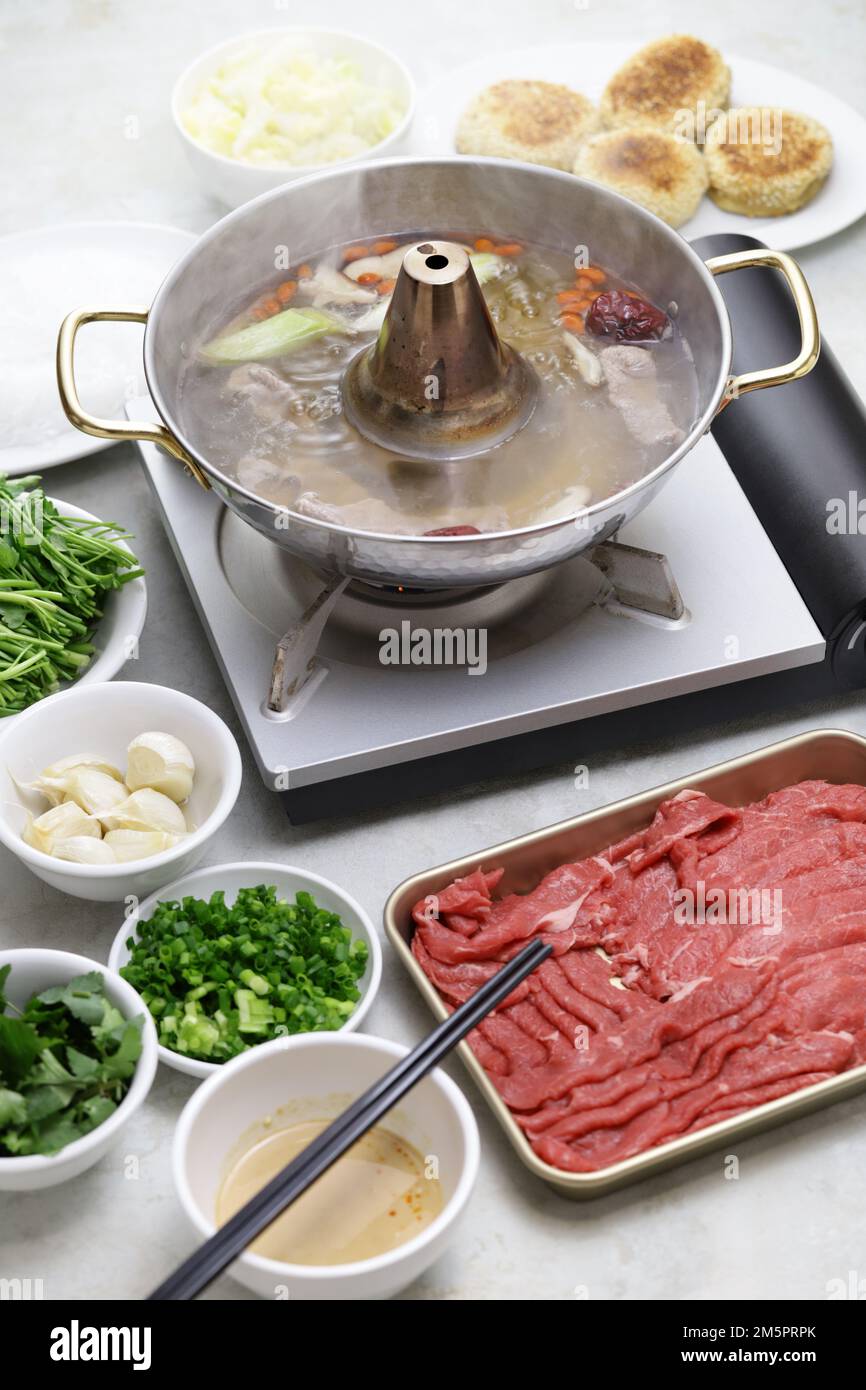 Beijing Shuan yang rou, Chinese hot pot lamb shabu shabu Stock Photo