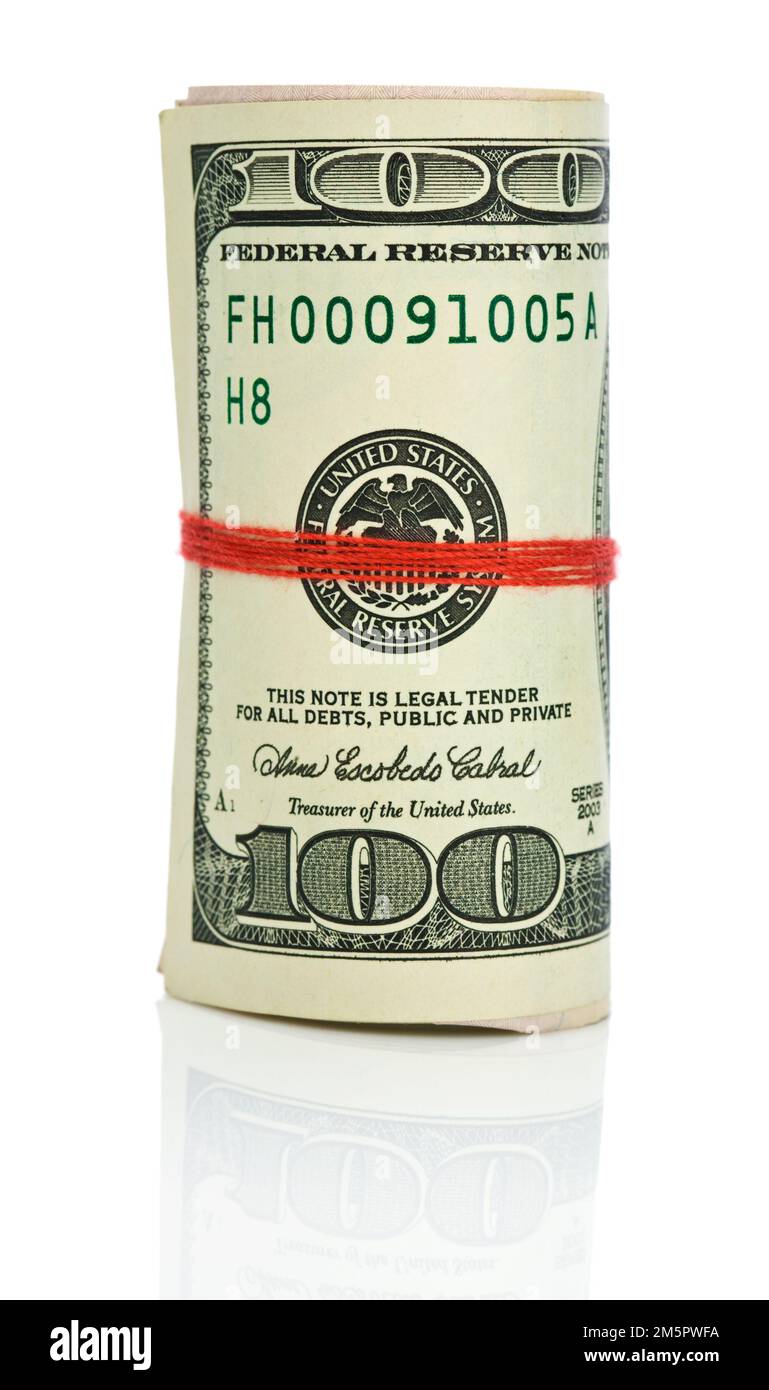 roll of dollars with red string Stock Photo - Alamy