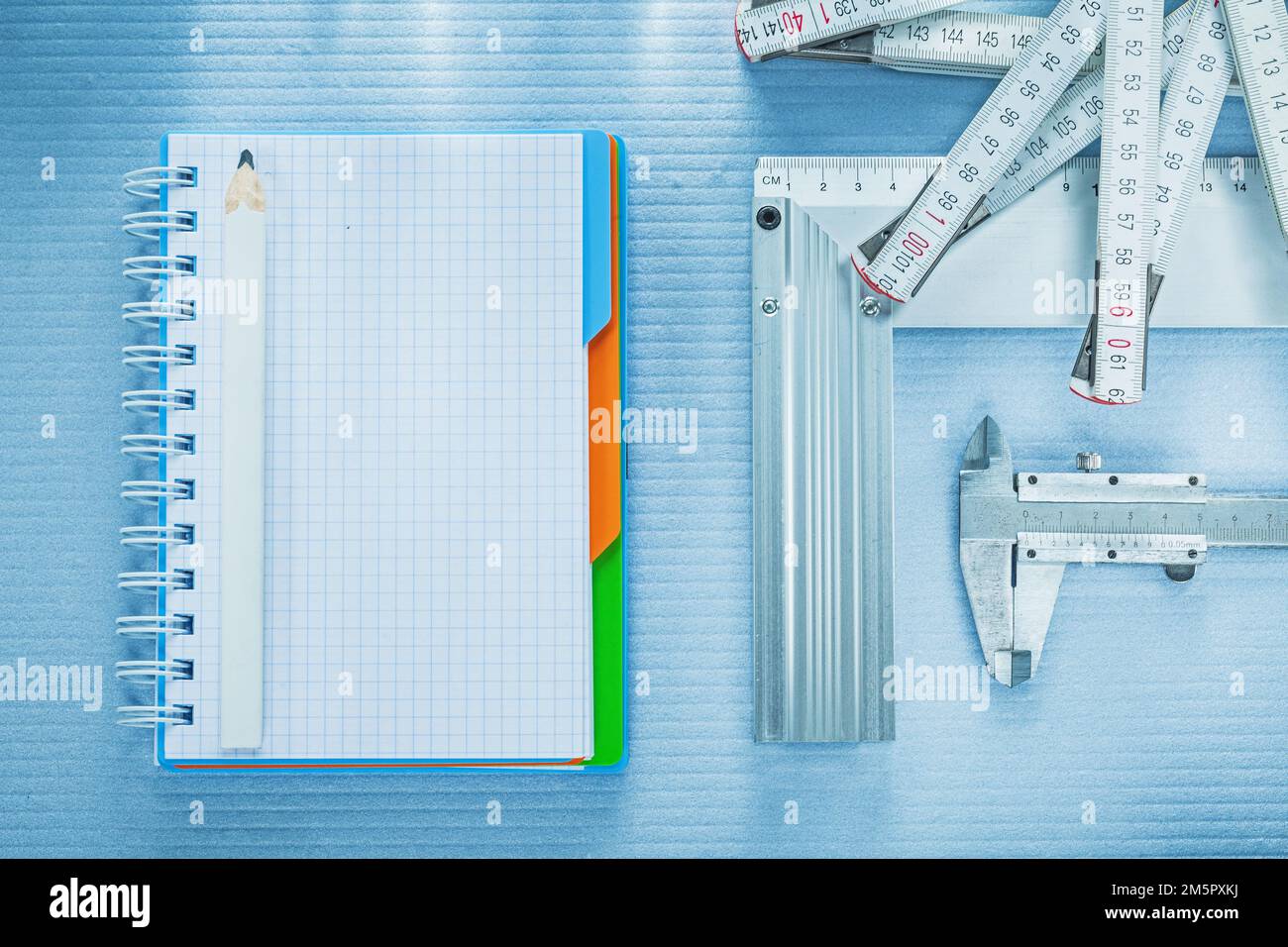 Square ruler vernier caliper notepad pencil tape measure Stock Photo Alamy