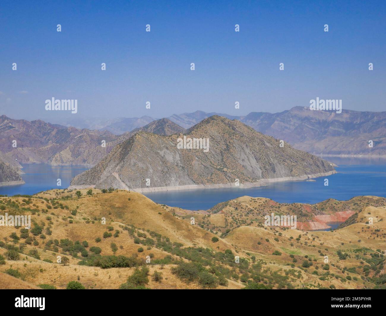 Colorful landscape view of Nurek dam lake second highest in world Colorful landscape view of Nurek dam lake second highest in world