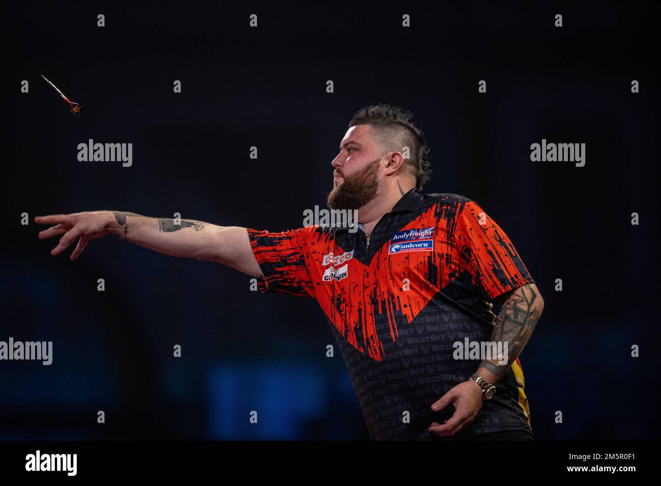 Michael Smith in action during day thirteen of the Cazoo World Darts
