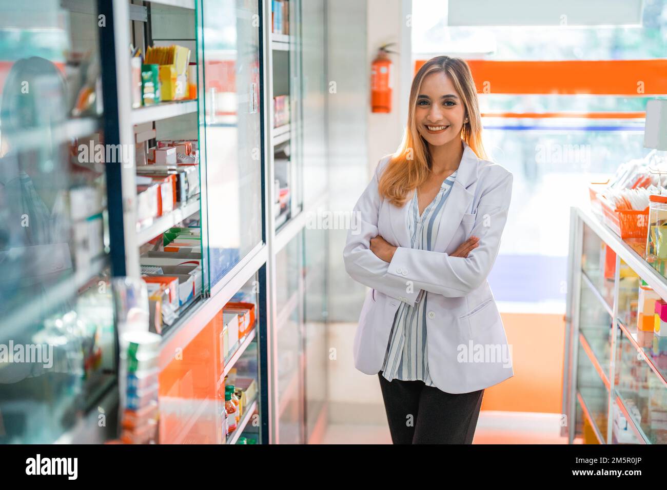Attractive smiling woman pharmacist hi-res stock photography and images ...