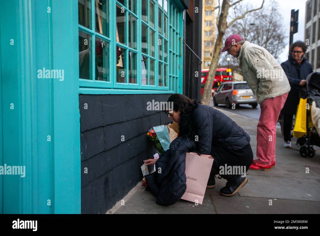 London, England, UK. 30th Dec, 2022. Floral tributes are seen outside original King's Road store of British fashion icon Vivian Westwood who died at 81 yesterday. (Credit Image: © Tayfun Salci/ZUMA Press Wire) Stock Photo