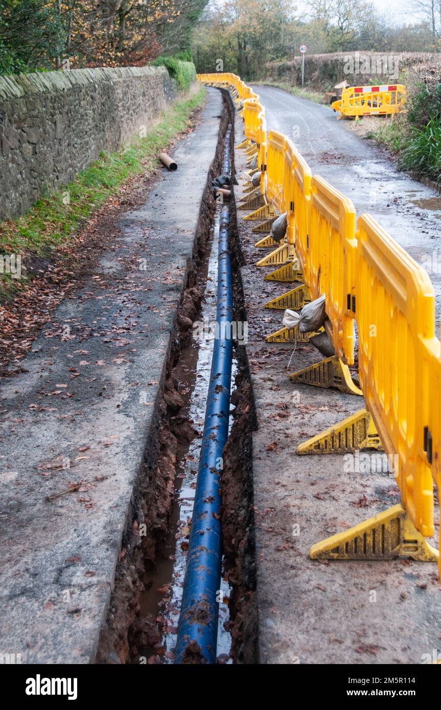Around the UK Water mains being replaced along a quiet country lane
