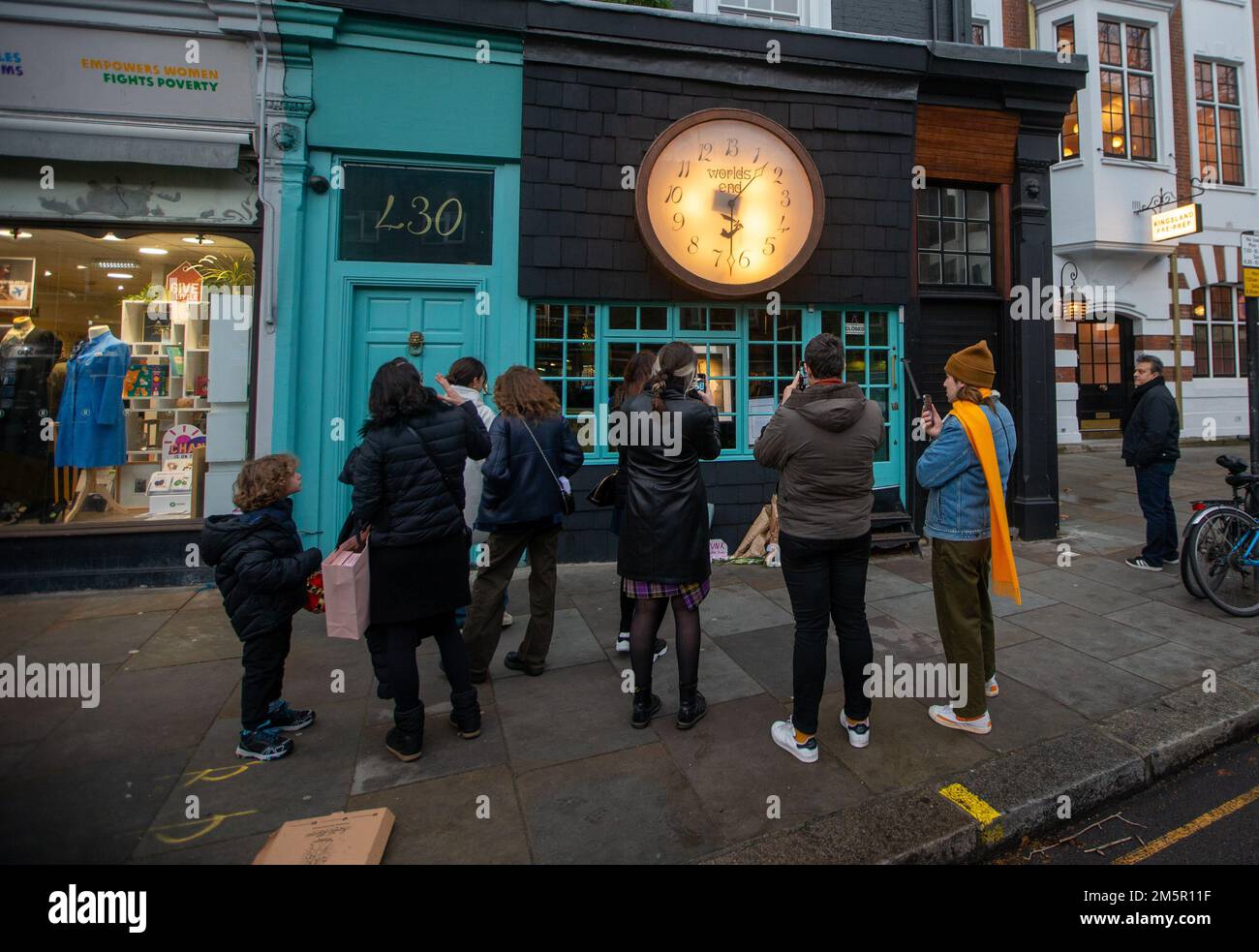 London, England, UK. 30th Dec, 2022. Floral tributes are seen outside original King's Road store of British fashion icon Vivian Westwood who died at 81 yesterday. (Credit Image: © Tayfun Salci/ZUMA Press Wire) Stock Photo