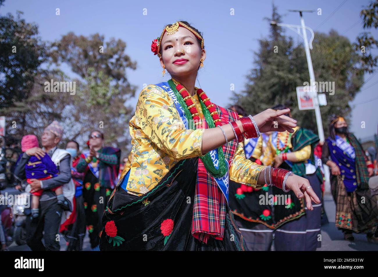 Kathmandu, Nepal. 30th Dec, 2022. A Gurung community girl wearing traditional attire seen singing and dancing as she celebrates the Tamu Loshar festival. Every year in the Nepali month of Poush (December), people from the Gurung community celebrate Tamu Lhosar/ their new year with respect to their own calendar system called Tamu Sambit with great enthusiasm. (Photo by Prabin Ranabhat/SOPA Images/Sipa USA) Credit: Sipa USA/Alamy Live News Stock Photo