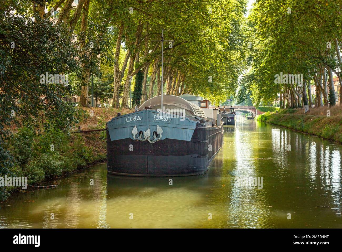 Tourism boat on the Canal du Midi, Southern France near Toulouse Stock Photo