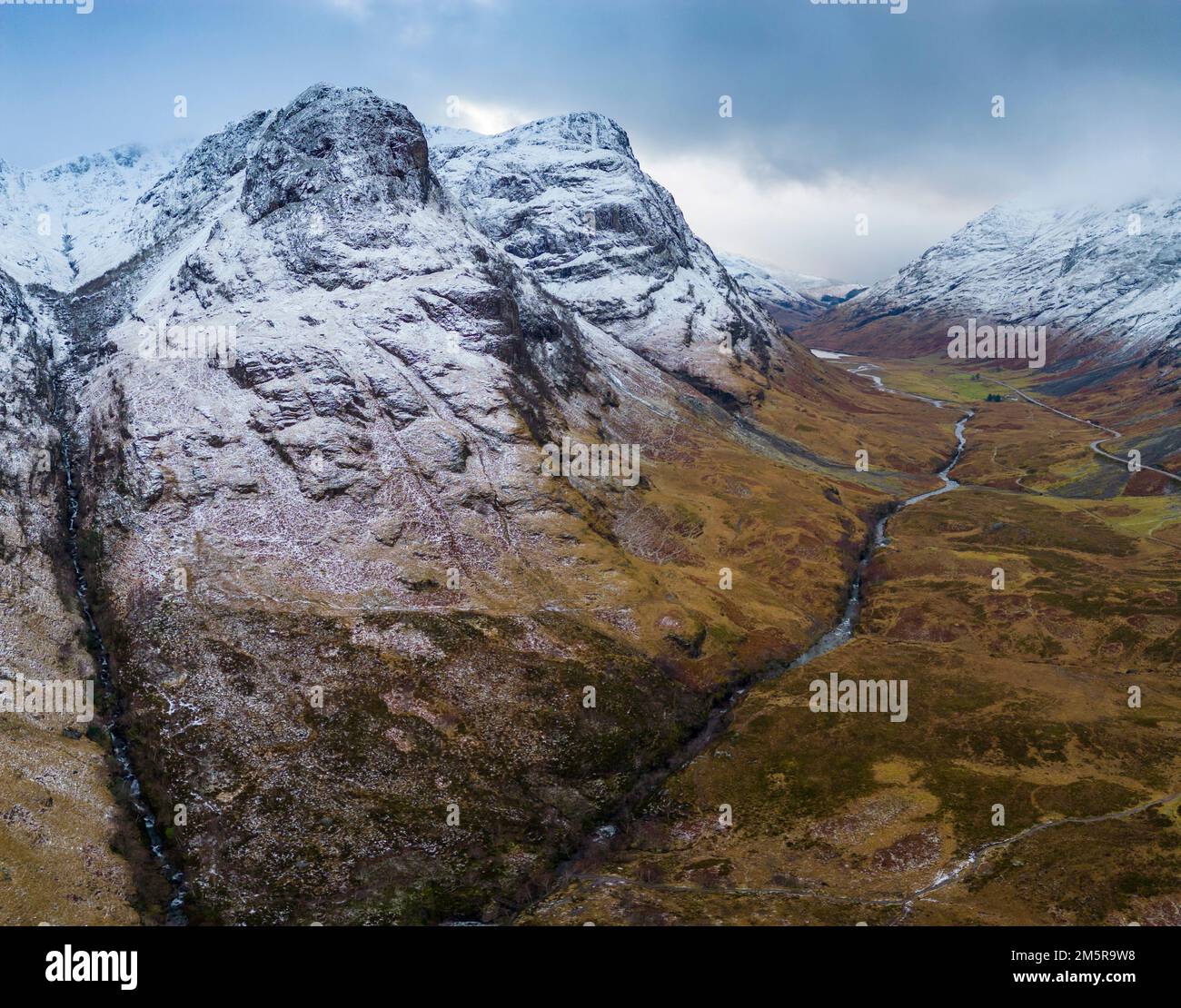 Aerial view of mountains in Glen Coe in winter snow, Scottish Highlands