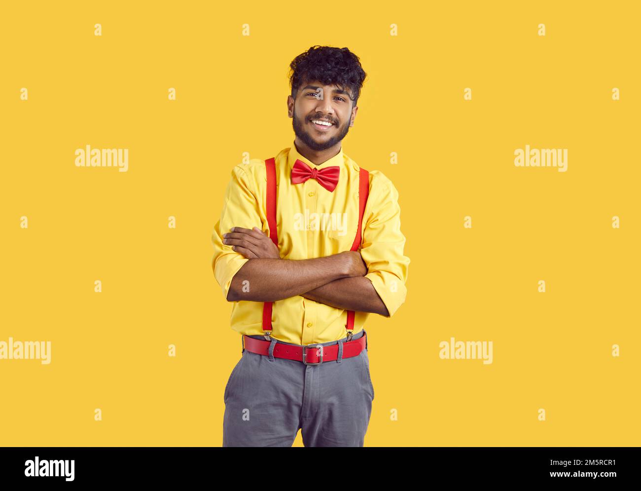 South indian man standing arms hi-res stock photography and images - Alamy