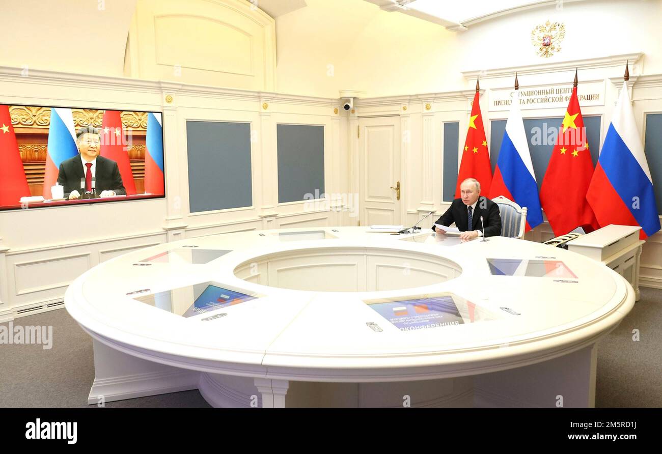 Moscow, Russia. 30th Dec, 2022. Russian President Vladimir Putin takes part in a remote bilateral meeting with Chinese President Xi Jinping via video link from the Kremlin, December 30, 2022 in Moscow, Russia. Credit: Mikhail Klimentyev/Kremlin Pool/Alamy Live News Stock Photo