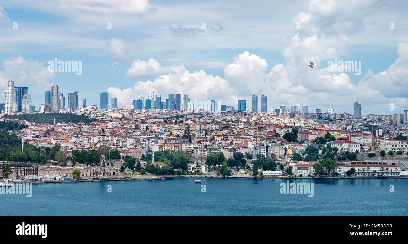 View from the sea to Istanbul. The coastline with old and new houses in the vicinity of the city. Summer panoramic landscape. Stock Photo