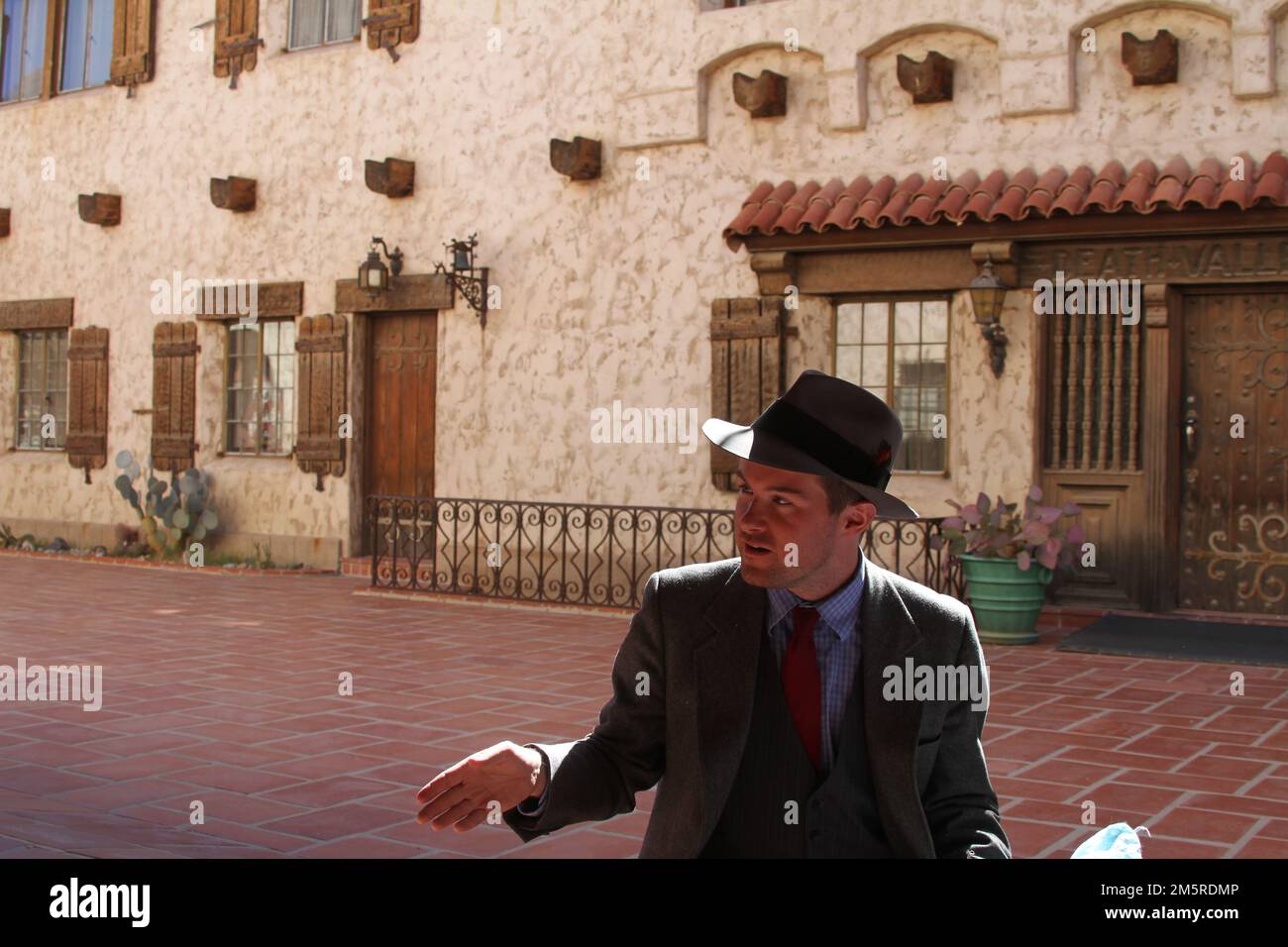 Tour guide at scottys castle death valley california stock photo alamy