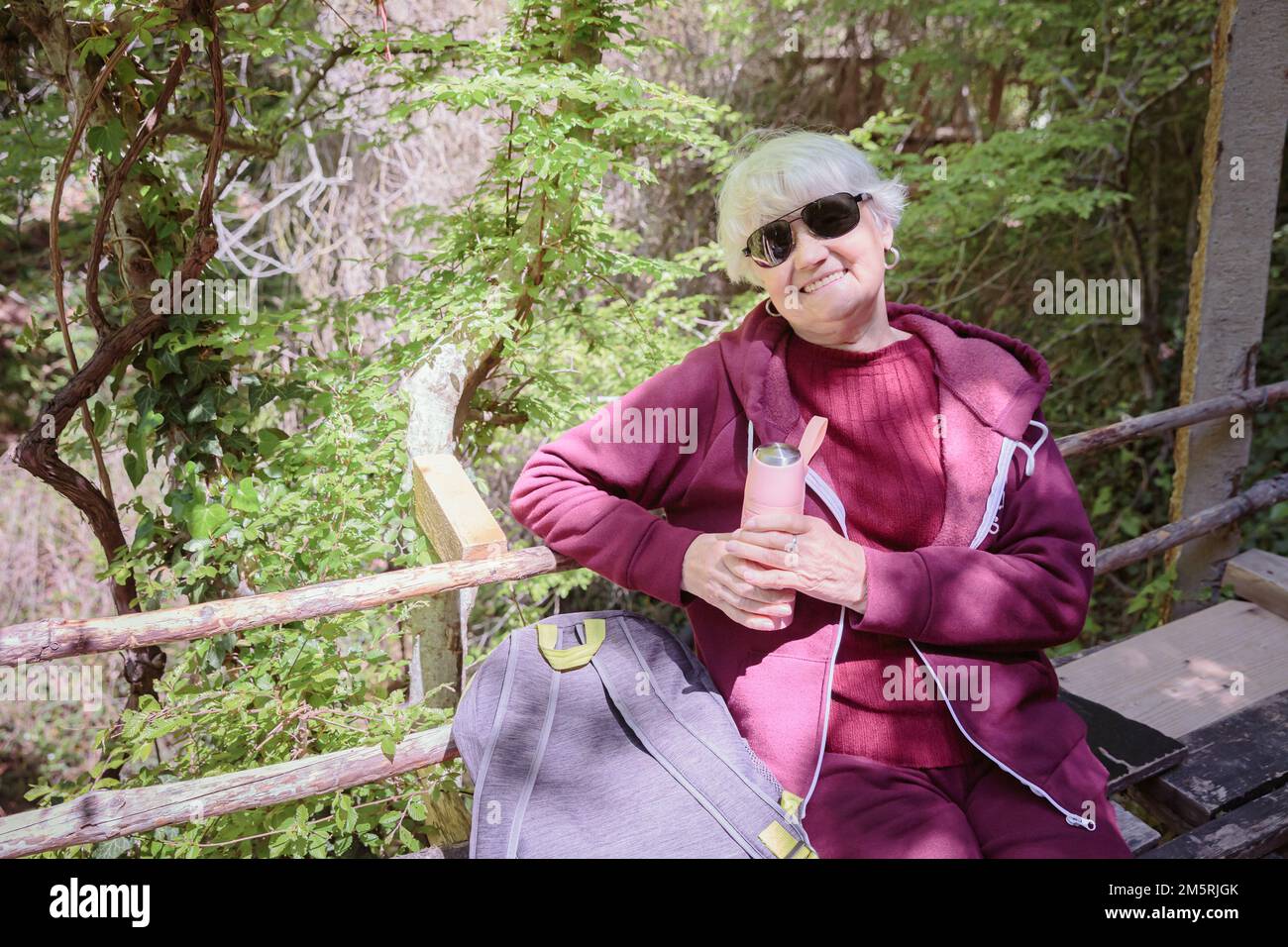 Mature woman walking forest hi-res stock photography and images - Alamy