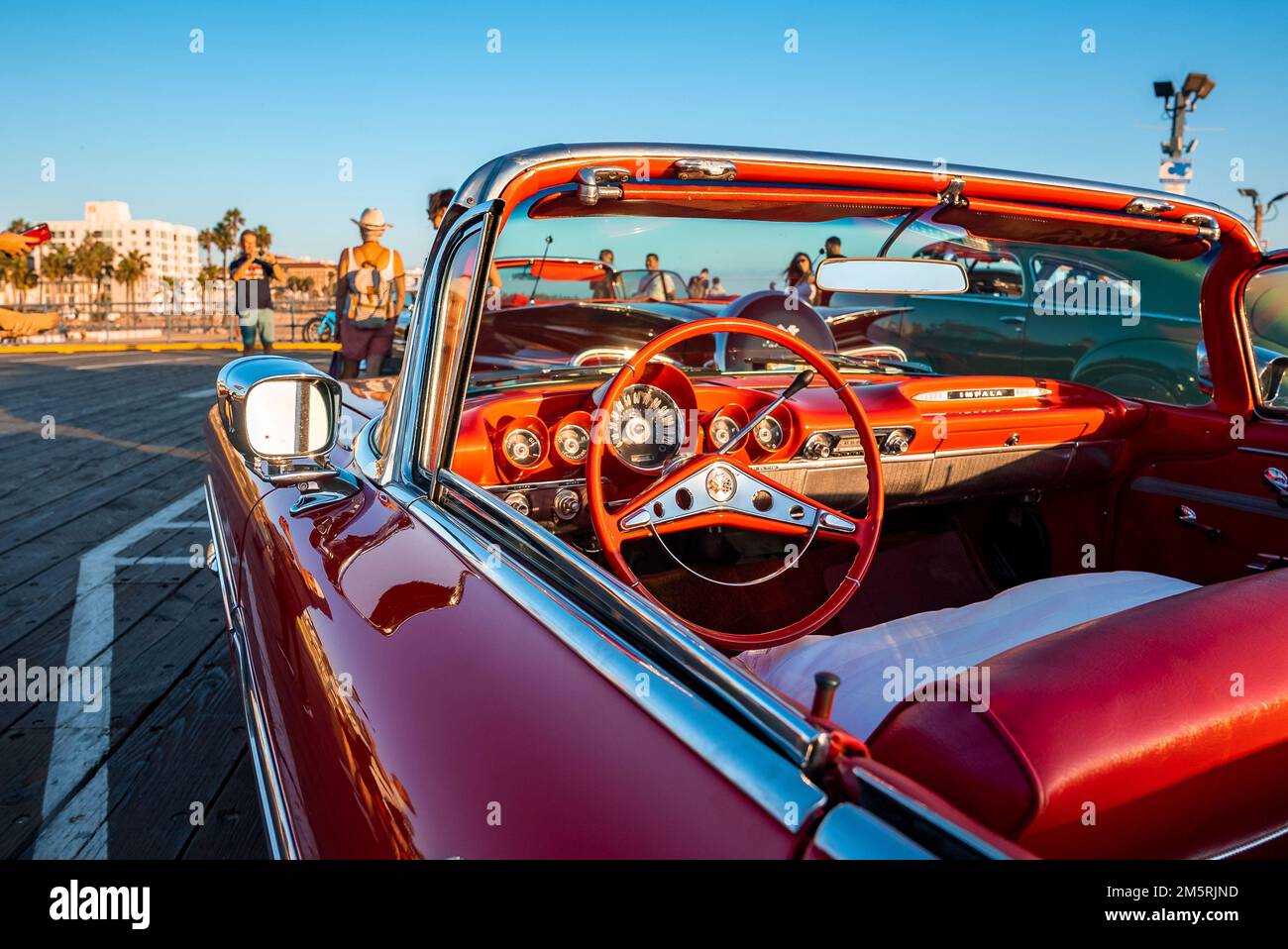 Vintage red car displayed during classic car show at Santa Monica wooden pier Stock Photo