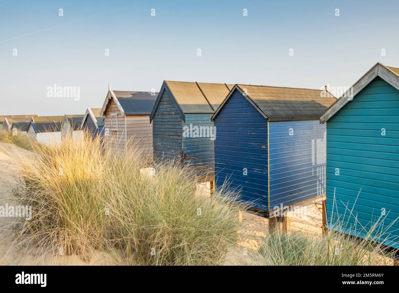 Rear view of Beach huts at Wells-Next-the-Sea Stock Photo