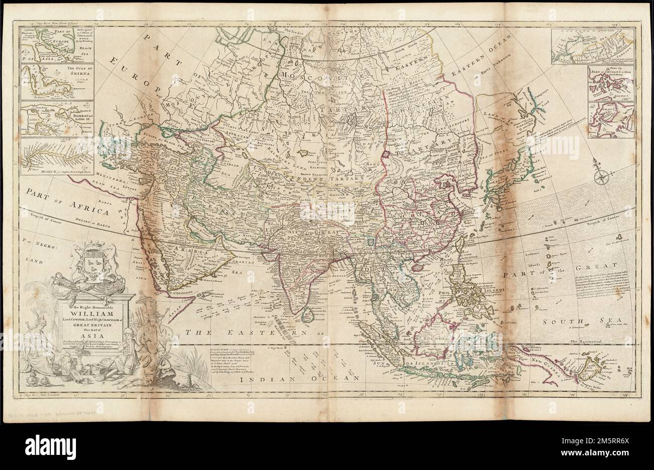 To the Right Honourable William, Lord Cowper, Lord High Chancellor of Great Britain, this map of Asia : according to ye newest and most exact observations is most humbly dedicated. Map of the Middle East and Asia including the East Indies. It features characteristic misconceptions of early 18th century cartography such as New Guinea as a peninsula of the southern continent and Iapon or Niphon [i.e. Japan] having a huge northern island called Land of Iesso [presumably the islands of Hokkaido and Sakhalin]. Prime meridians: Ferro and London. Relief shown pictorially. Dedicated to Lord Cowper, Hi Stock Photo