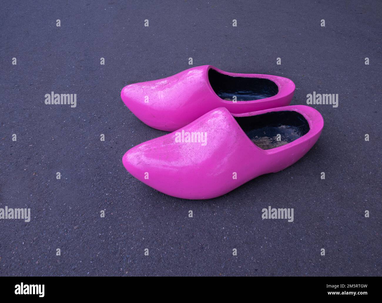A pair of pink traditional Dutch wooden clogs in Netherlands Stock Photo